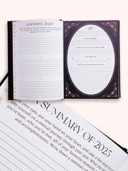 Open planner with pages titled 'Goodbye 2023' and 'Summary of 2023' on a white background.