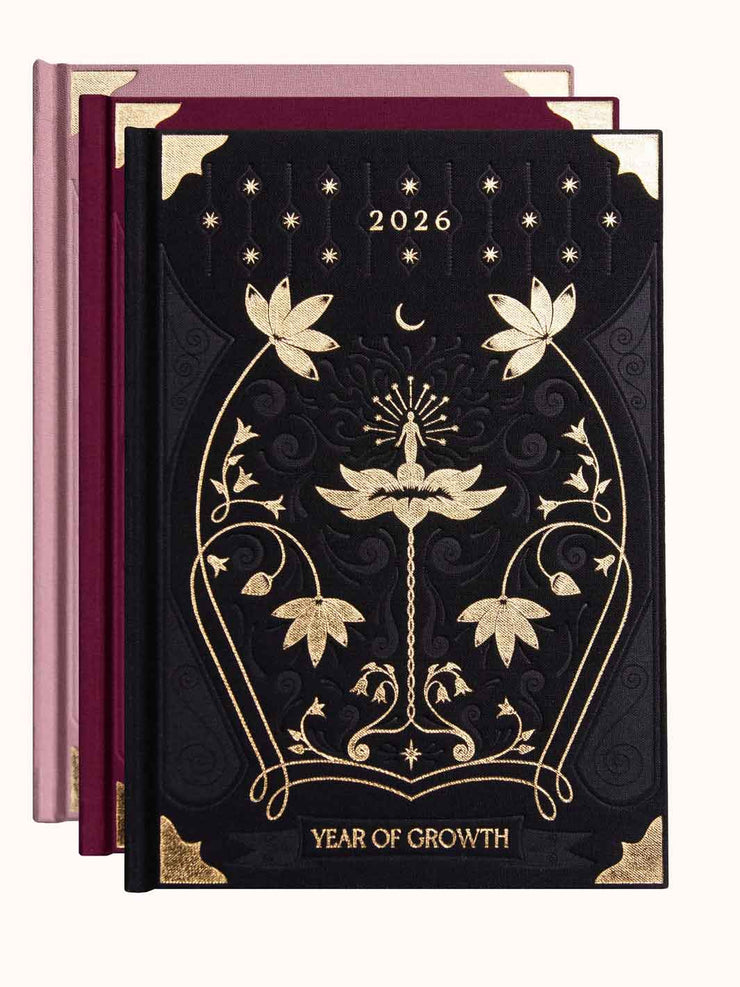 Decorative planner with floral design and &