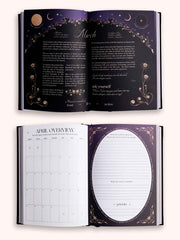 Open planner with celestial design on a white background