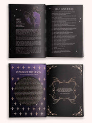 Open book with purple and black design elements on a white background