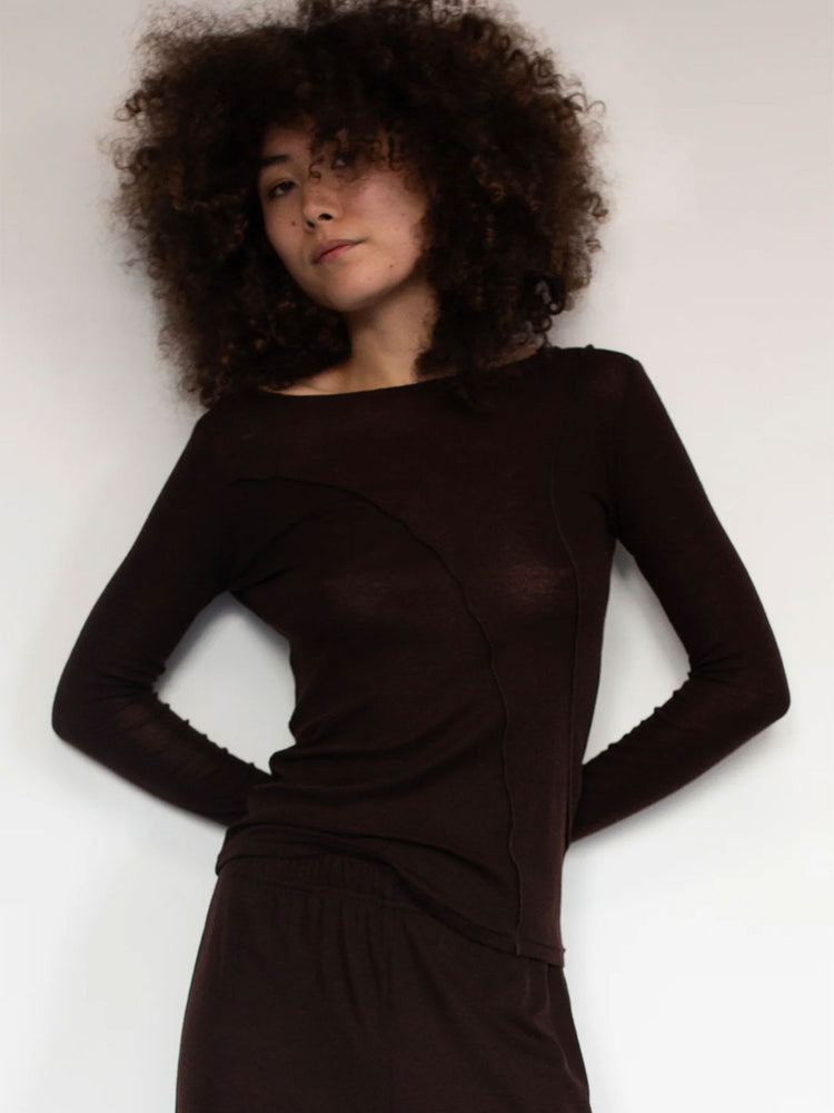 Chocolate Brown Boat Neck Stretch Knit Long Sleeve Top With Exposed Asymmetric Seam Details. By The Weft
