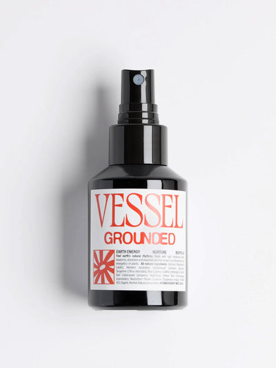 Black spray bottle labeled 'Vessel Grounded' on a light gray background