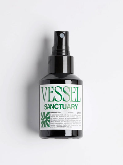 Black spray bottle labeled 'Vessel Sanctuary' on a white background