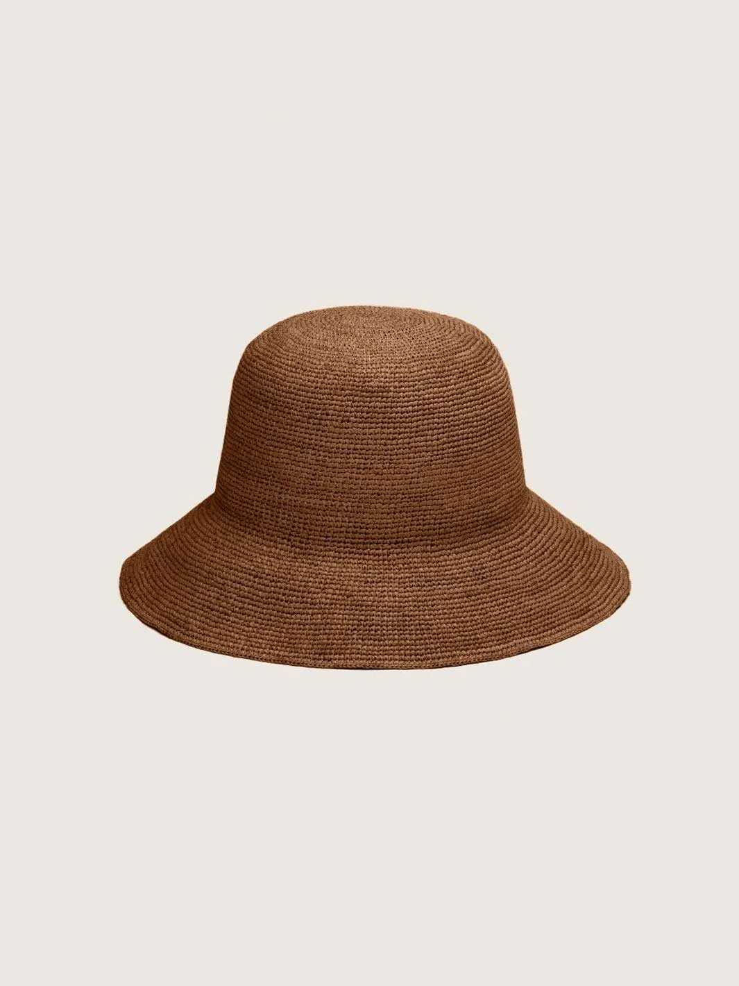 A brown woven straw bucket hat centered on a light gray background.
